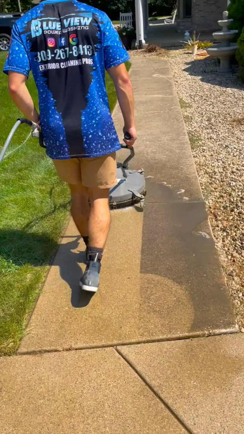 Driveway pressure washing in Peoria, IL.