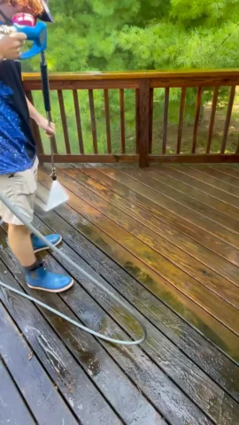 Deck pressure washing in Peoria, IL.