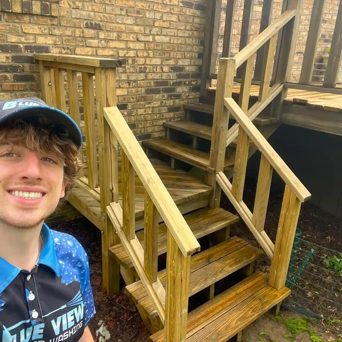 After deck washing in Peoria, IL, showing clean and restored wood.