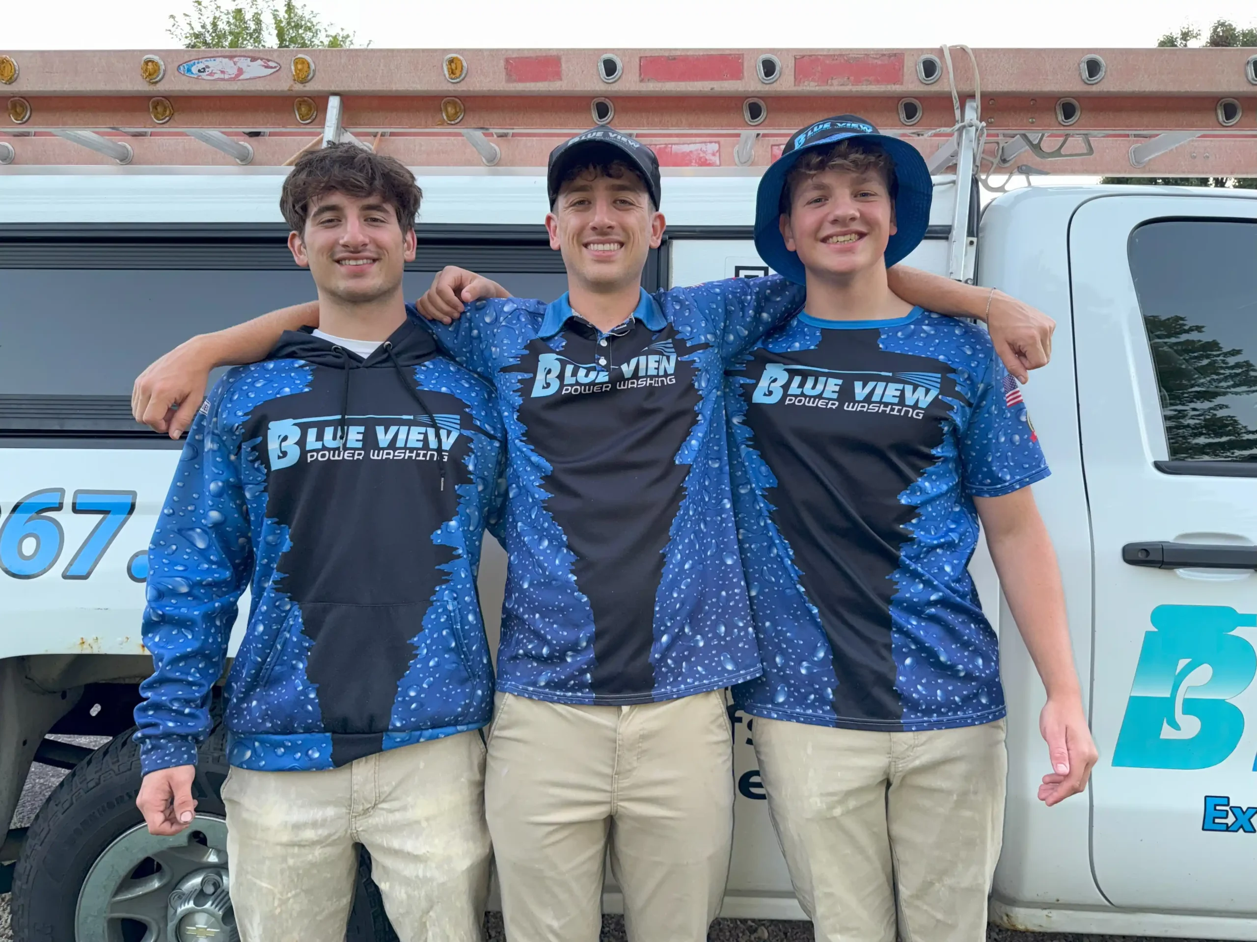 Photo of the Blue View staff standing Infront of the truck